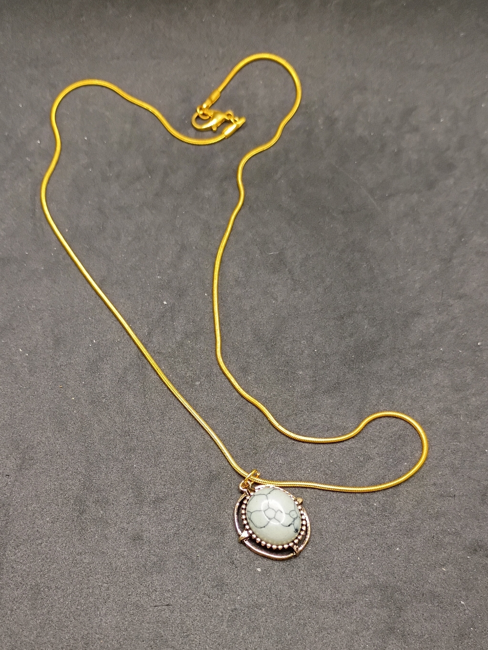 Gold Tone Chain Necklace with White Howlite Pendant